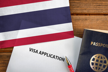 Fototapeta na wymiar Visa application form, passport and flag of Thailand 
