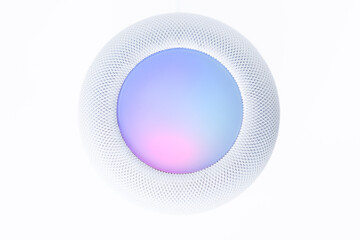 Modern music speaker on white background, view from above