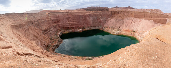 Pristine  natural beauty of the deep blue Hidden Lake near the Timna park,surrounded by mountains near Eilat city, Arava Valley, southern Israel