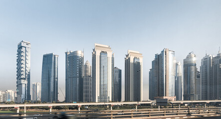 View from the window of a tourist bus on the architecture in Dubai city, United Arab Emirates