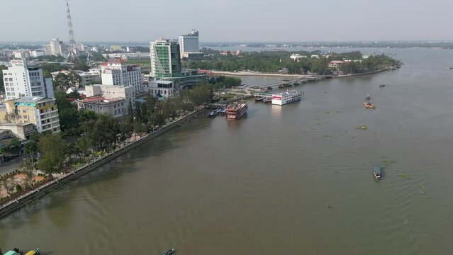 Drone footage above the Mekong river in Can Tho city, capital of Mekong Delta in south Vietnam. Camera moves foward above the river 2-2