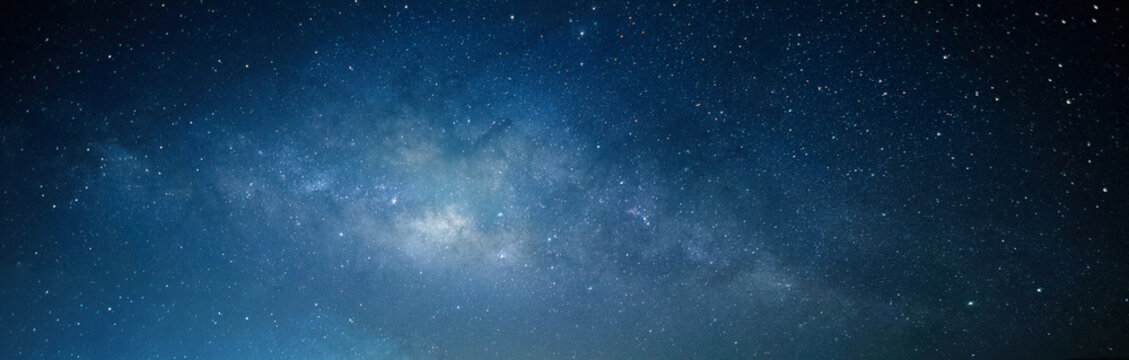 Space background with night starry sky and Milky Way. Dark blue nebula. © Amonsak