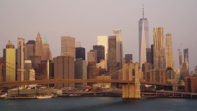 Cinematic skyline panorama of New York City by golden hour - Wide shot panoramic