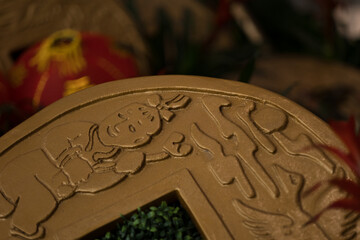 To celebrate the Chinese new year (lunar new year), decorations representing gold coins are placed as an auspicious symbol.