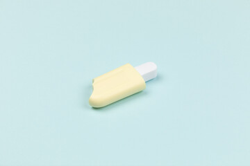 closeup of a popsicle on cyan surface icecream
