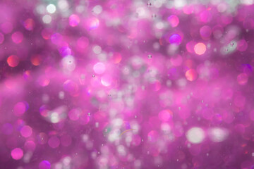 Abstract purple bokeh with black background