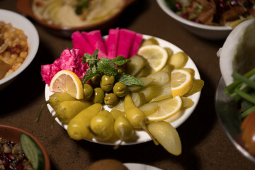 Olives and pickled vegetables, served Syrian style.