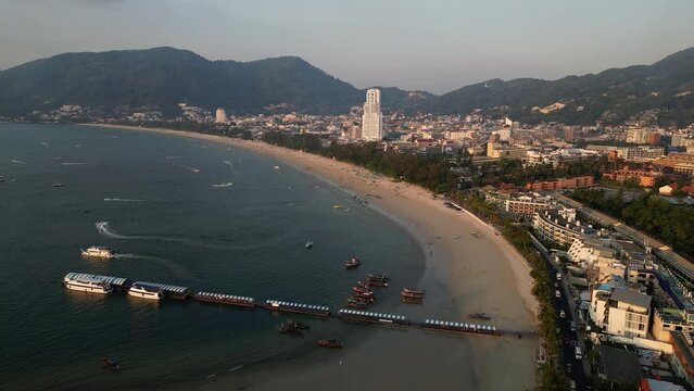 Phuket, Thailand: Aerial drone footage of the famous Patong beach and resort town in Phuket in southern Thailand. Shot with a forward motion