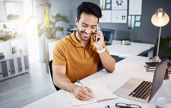 Happy man, phone call and writing notes for business planning, online project or creative development. Asian person or graphic designer talking in office communication, notebook planner and computer
