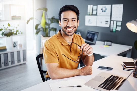 Happy, Smile And Portrait Of A Businessman In The Office While Working On A Project With A Laptop. Confidence, Leadership And Professional Male Employee Planning A Company Report In The Workplace.