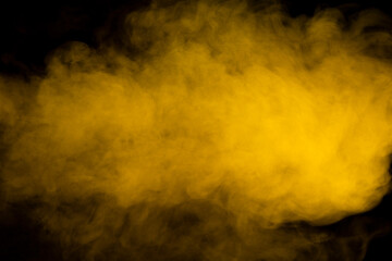 Yellow steam on a black background.