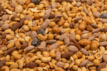 A group of almonds, pistachios, walnuts, macadamia, cashews.
