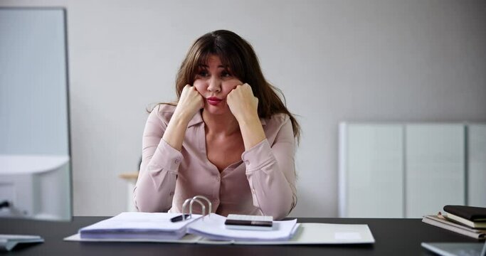 Unhappy Stressed Woman Using Computer In Office