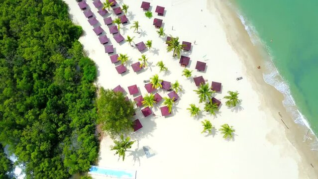white sand beach on tropical paradise island with aqua blue sky sea water langkawi