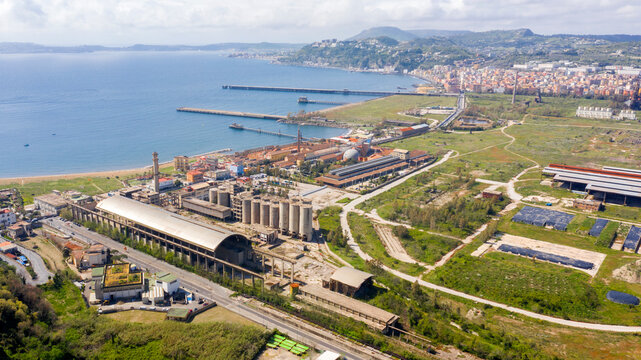 Aerial view of the ex Italsider area of Bagnoli from the Posillipo hill, in the metropolitan city of Naples, Campania, Italy. It's a disused industrial complex on the coast of Mediterranean sea.