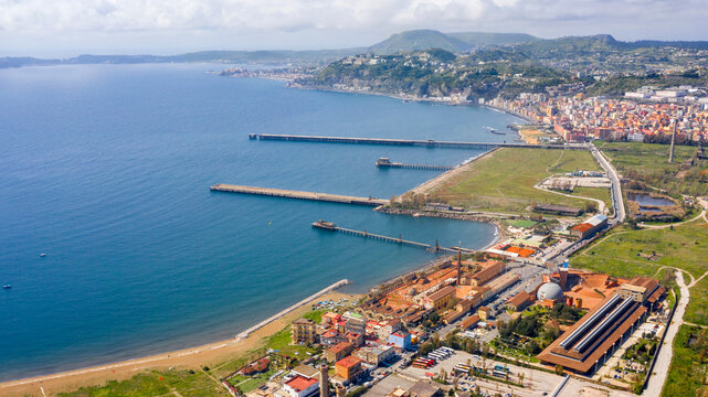 Aerial view of the ex Italsider area of Bagnoli from the Posillipo hill, in the metropolitan city of Naples, Campania, Italy. It's a disused industrial complex on the coast of Mediterranean sea.