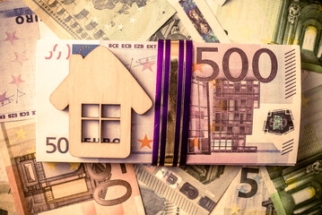 The symbol of the house stands on the background of the Euro
