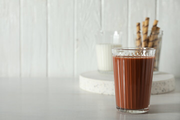 Tasty fresh summer dessert - chocolate milkshake, space for text