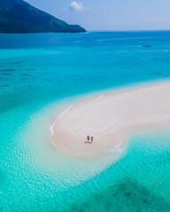 Koh Lipe Island Southern Thailand with turqouse colored ocean and white sandy beach at Ko Lipe
