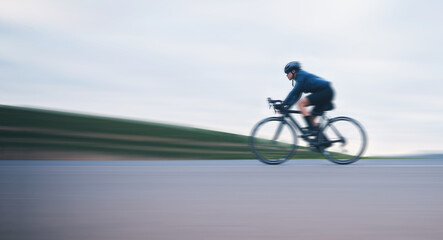 Fototapeta na wymiar Motion blur, race and cycling with woman on road for training, competition and championship. Workout, sports and triathlon with female cyclist riding on bike for freedom, exercise and fast with speed