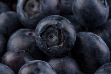 Blueberries on stone plate background