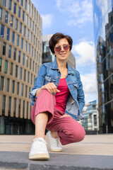 young stylish woman, Jewish girl  wearing sunglasses in the city