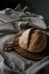 Artisan Batard Sourdough healthy Bread. Open crumb high hydration Sourdough french country bread set on dark background. - 594565165