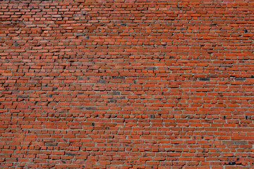 Naklejka premium Vintage masonry. red brick wall, background for design