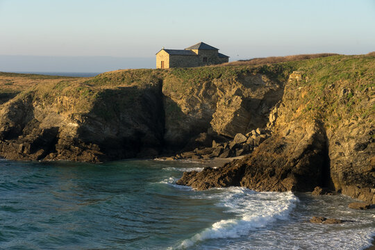 Santa Comba hermitage in the Santa Comba beach in the coast of Galicia at sunset in a sunny day. A Coru&ntilde;a, Spain.