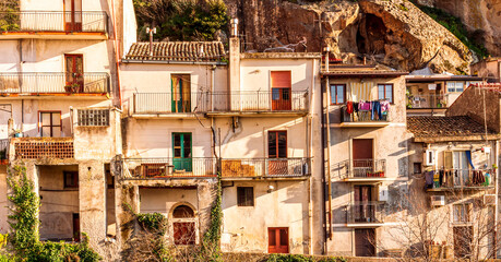 poor district of latin or european ghetto in a provincial town, urban area with yellow old ancient buildings