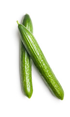 Fresh green cucumbers isolated on white background.