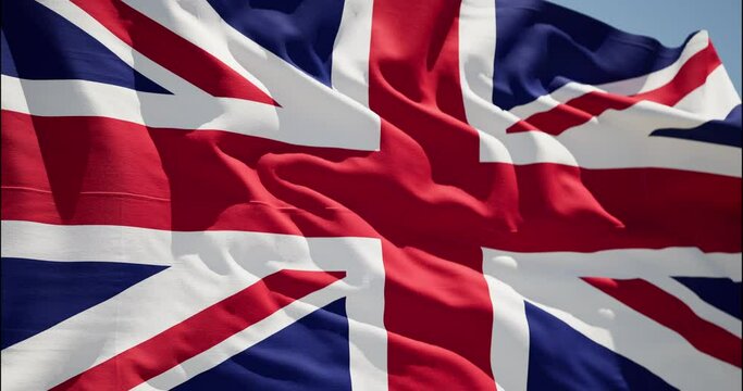 United Kingdom waving flag. UK British National closeup. Empire Banner Flaping in Wind