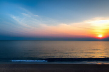 Naklejka na ściany i meble Close-up Of Sea Against Sky At Sunset