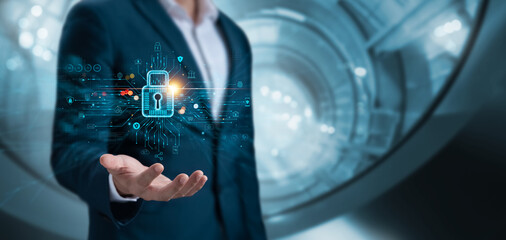 Cyber ​​security and data protection, businessman holding padlock Internet network security system, protecting business and financial transaction data from cyber-attacks, secure data encryption.