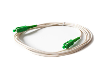 Fiber optic cable isolated on white background. Fiber optic cables are made of glass filaments,...