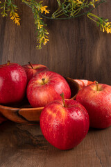 Red apple fruit isolated on wooden background