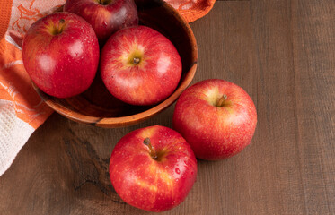 Red apple fruit isolated on wooden background