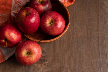 Red apple fruit isolated on wooden background
