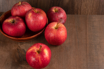 Fototapeta na wymiar Red apple fruit isolated on wooden background