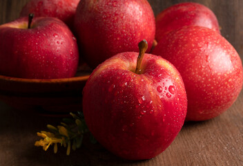 Red apple fruit isolated on wooden background