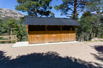 Wooden huts to store rubbish bins in a national park in the Catalan Pyrenees