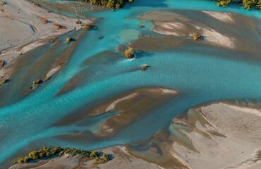 Bird's eye view of river braiding, Aoraki Mt Cook national park, New Zealand. Blue and turquoise...