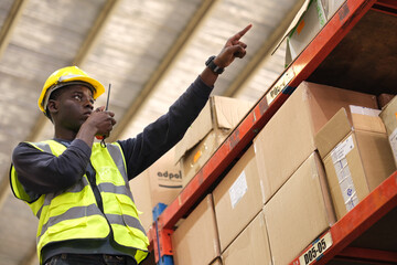 Group of Industrial workers working at a warehouse factory.