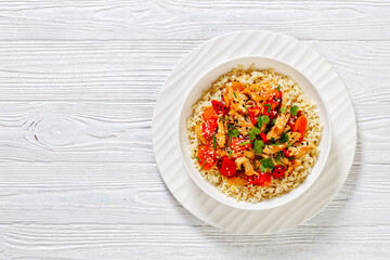 sweet and sour chicken with veggies and rice