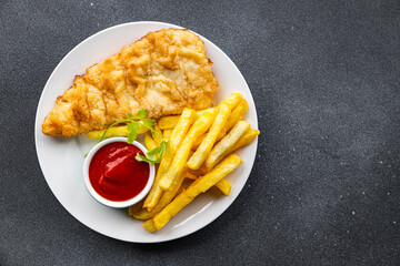 fish and chips french fries deep fried fast food  meal food snack on the table copy space food...