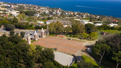 Aerial view of the entrance of Virgiliano park, also called Park of Remembrance, a scenic park located on the hill of Posillipo, Naples, Italy. From the promontory there's a view of the Gulf of Naples