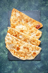 top view tasty gutabs thin delicious hotcakes with meat on dark background pastry bake pie cake dough oven meal