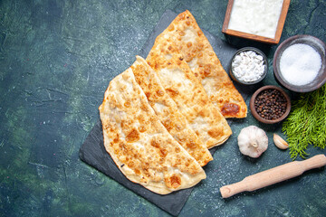 top view tasty gutabs thin hotcakes with pepper and salt on dark background color hotcake meal oven pie pastry cake