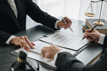 business woman offers bribes to lawyers To help with legal matters in court, bribes corruption illegal fraud bribery concept.