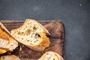 baguette long fresh bread whole wheat flour sourdough meal food snack on the table copy space food background rustic top view